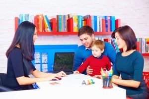 family in office, at the professional